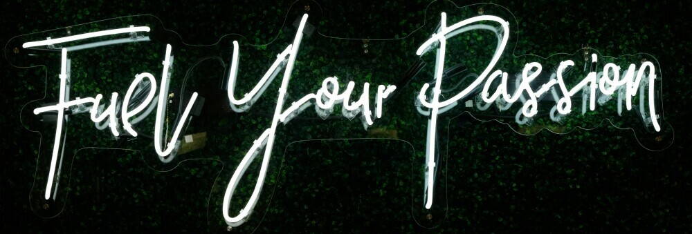 Neon sign that says "Fuel Your Passion"